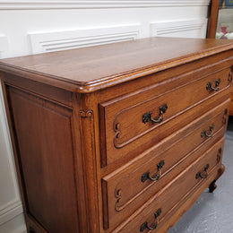 French Louis 15th style Oak three drawer chest of drawers with wooden top. It has been sourced from France and is in good original detailed condition.