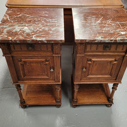 Pair French Oak Henry II style rouge marble topped bedside cabinets. Consisting of one drawer, one cupboard and a bottom shelf. Carved decoration and turned legs. Circa: 1900's.
