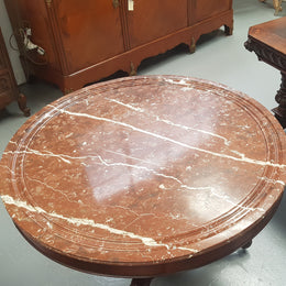 A superb early 19th century French Louis Philippe mahogany centre table, with original round carved rough marble with reeded-edge and is in good original condition.
