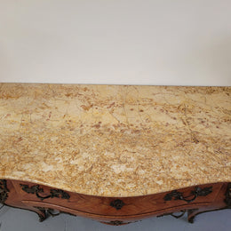 French Louis XV style marquetry inlaid two drawer marble top commode with deorative ormolu trim. In good original detailed condition with working double lock and key.
