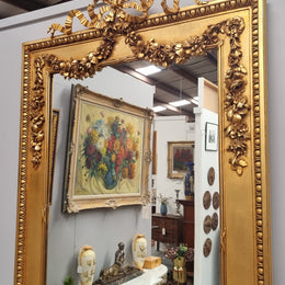 Stunning Vintage French floral gilt framed overmantel mirror. It has been sourced from France and is in good original detailed condition.
