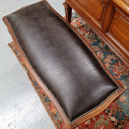 Impressive French Louis 15th style walnut upholstered duet leather stool. Very Good Condition.  Circa: 1930’s, sourced in France.
