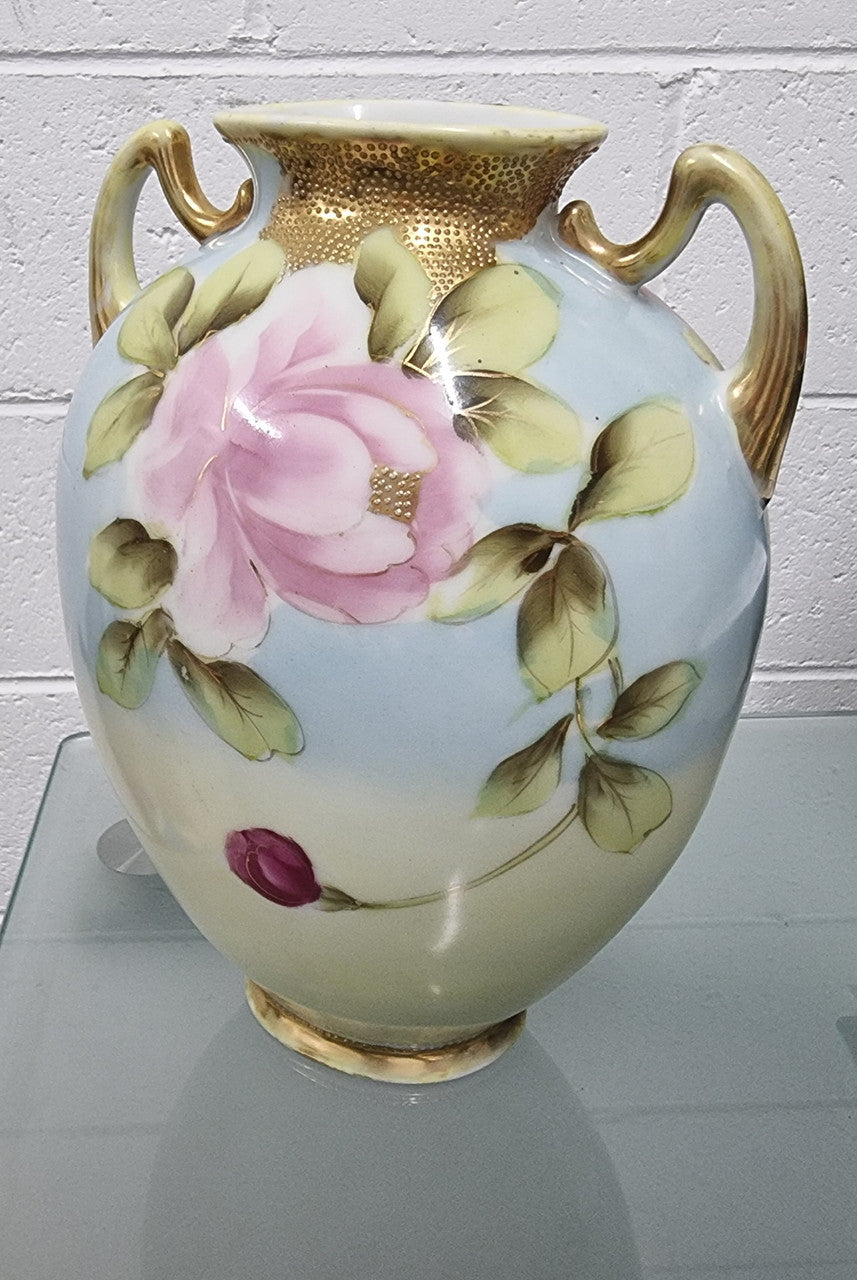 Lovely hand painted double handled vase in great original condition. Please see photos as it forms part of the description.