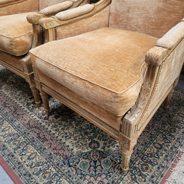 Pair of Louis XVI style painted arm chairs with carving & fluted legs. They have been sourced from France and the fabric is in good used original condition. Please view photos as they help form part of the description.