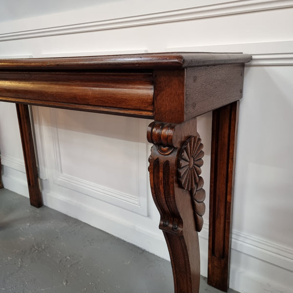 Beautiful 19th Century French Oak console table of great narrow proportions. It has been sourced from France and it is good original detailed condition.