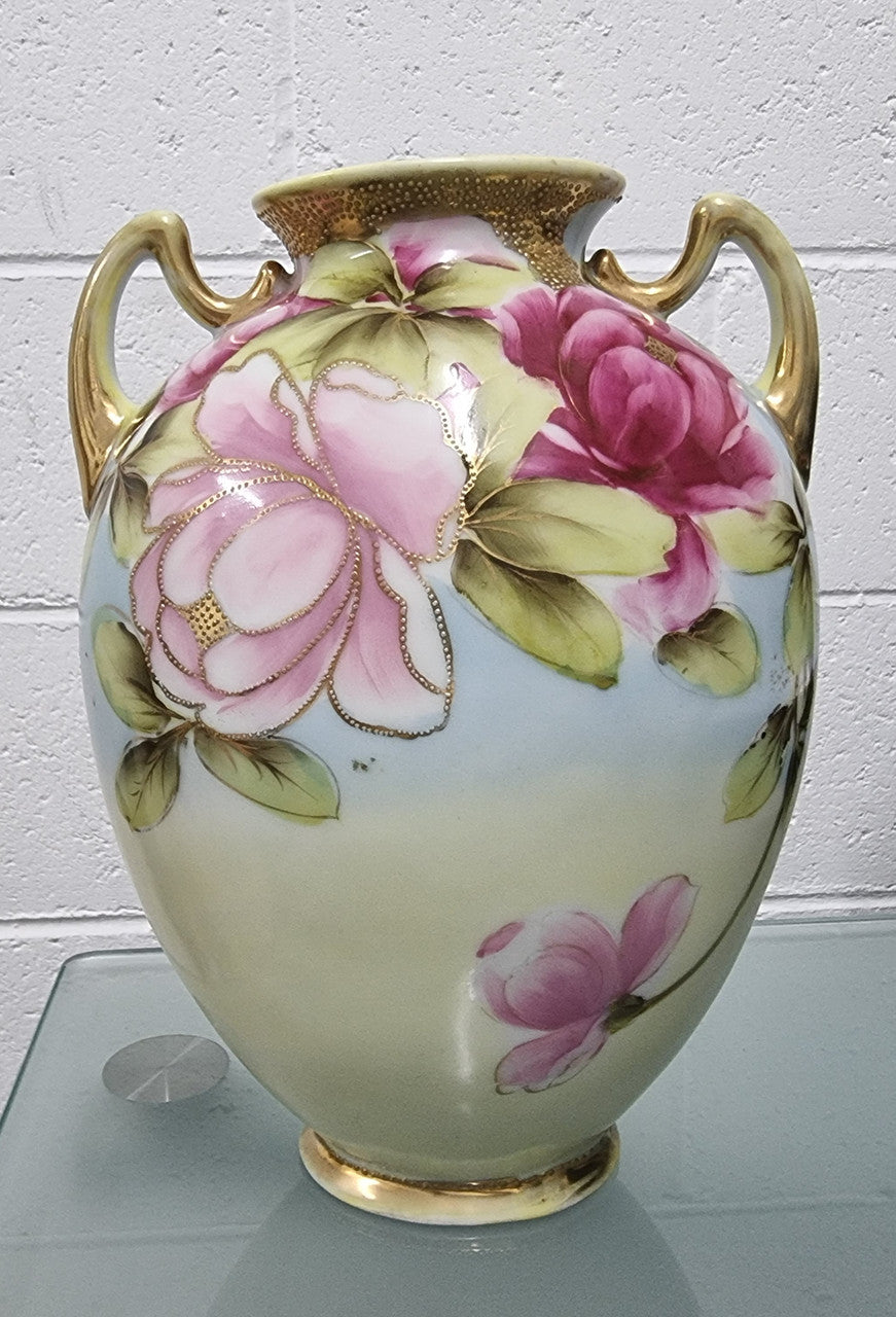 Lovely hand painted double handled vase in great original condition. Please see photos as it forms part of the description.