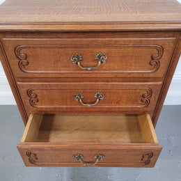 French Oak Louis XV style side drawers with lovely handles and three drawers. It has been sourced from France and is in good original detailed condition.