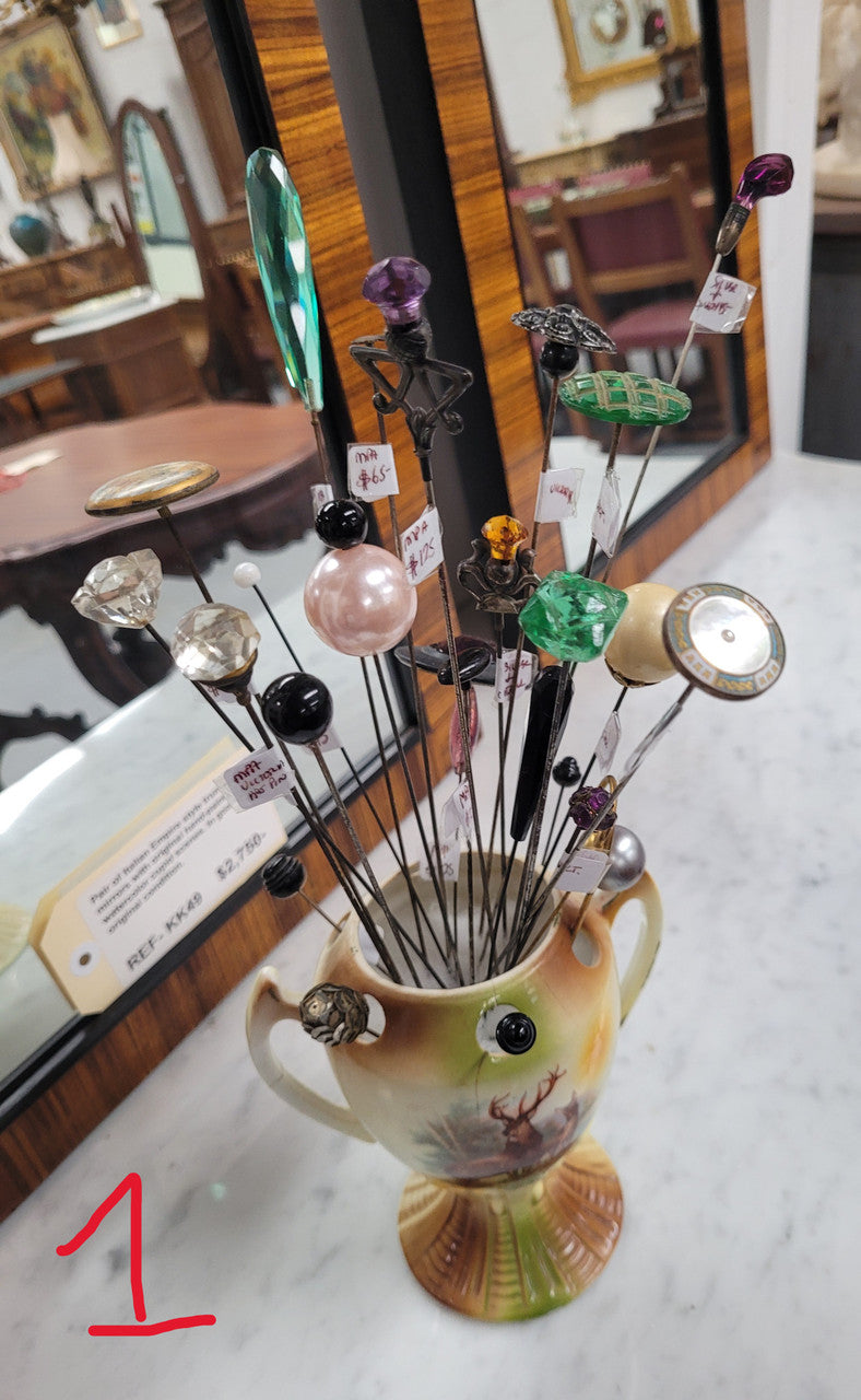 We stock a range of assorted Vintage/Antique hatpins which start from $6. Please view photos to see our current range. You are able to purchase our hat pins by either emailing us or calling us to confirm availability and prices.