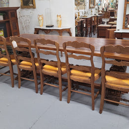 French style reclaimed Elm Farmhouse table with stretcher base and amazing carving underneath. Table can sit 10-12 people and is in good original detailed condition.