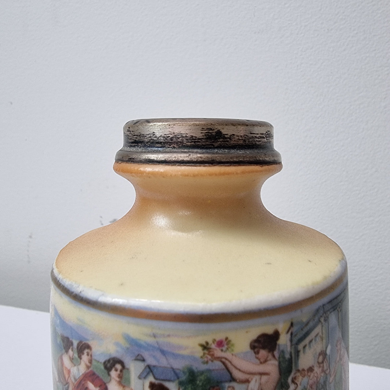 Antique silver top vase with interesting scenes. Please view photos as they form part of the description. In good original condition.