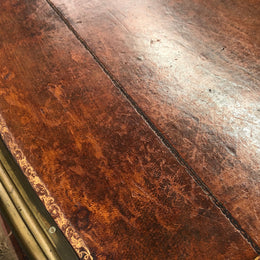 An impressive French Walnut petite Bureau Plat with superb ormolu mounts, original tooled leather top with loads of character and drawers for storage. It is in very good original detailed condition.