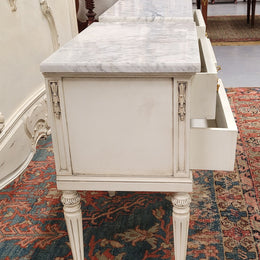 Attractive pair of Vintage French Louis 16th style two drawer marble topped bedsides. They have been sourced from France and are in good original condition.