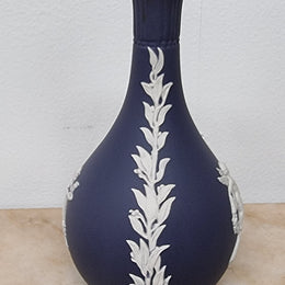 Wedgwood blue and white Jasper Ware bud vase. It is in good original condition with no chips or cracks, please view photos as they help form part of the description.