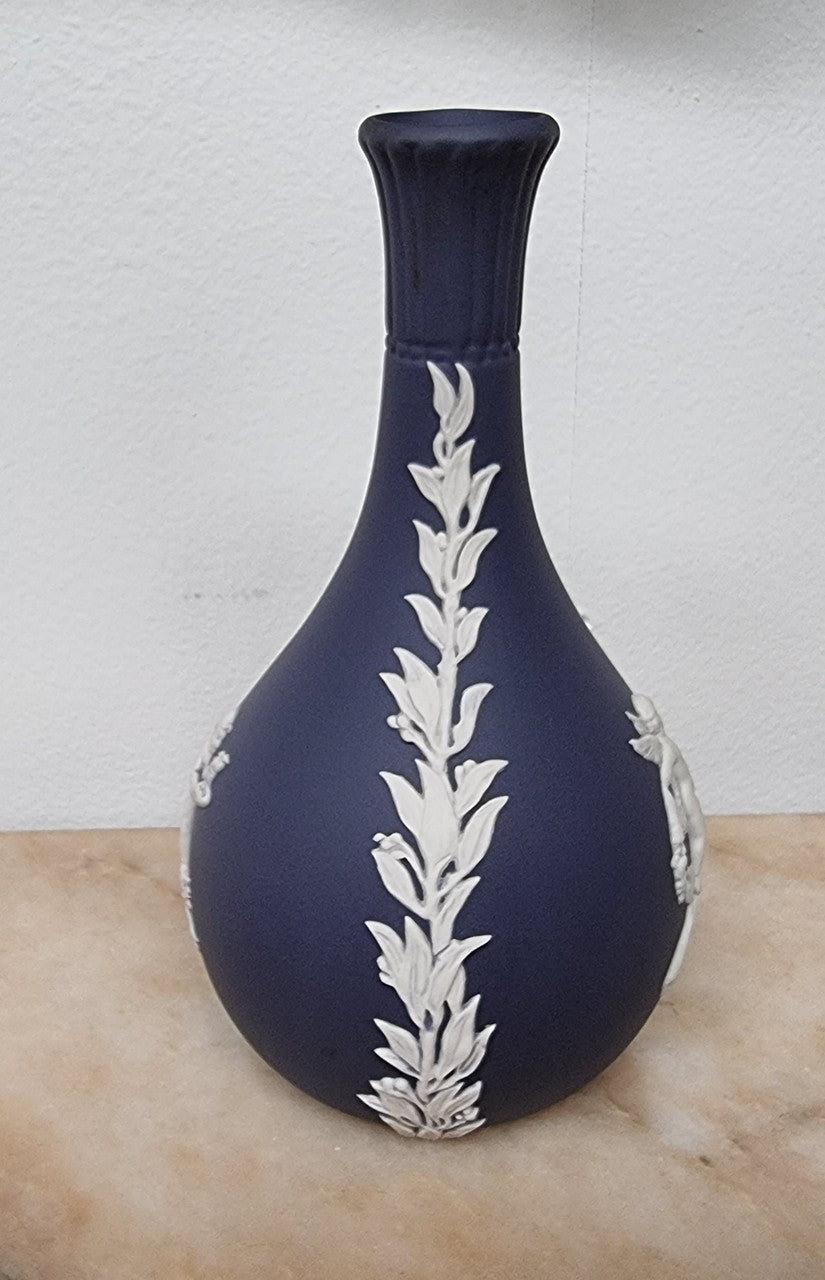 Wedgwood blue and white Jasper Ware bud vase. It is in good original condition with no chips or cracks, please view photos as they help form part of the description.