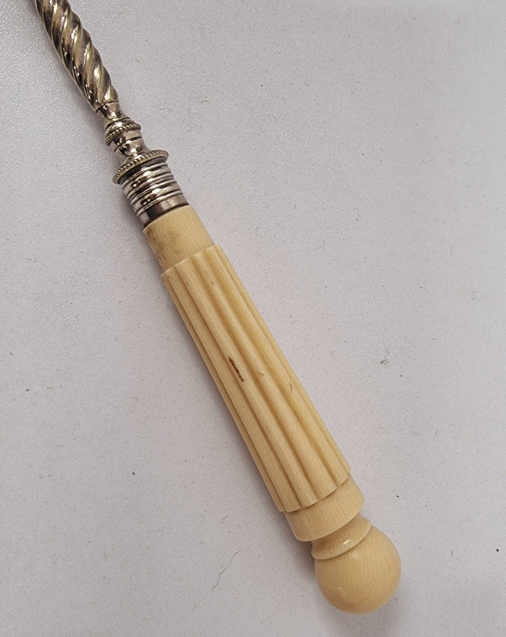 Elegant Antique pickle fork with a ivory handle. It is in good original condition, please view photos as they help form part of the description.