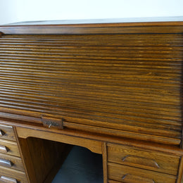 An Antique American Oak Cutler Roll Top Desk