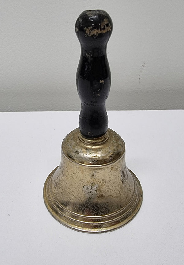 Wooden handled brass bell. It is in good original condition and has been sourced locally. Please view photos as they help form part of the description.