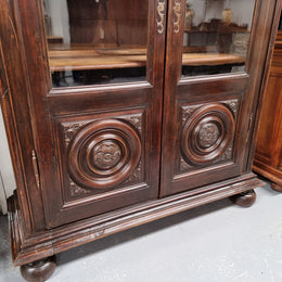 Substantial French Henry 2nd Walnut two door bookcase. It has five fully adjustable shelves and has been sourced from France. It is in good original detailed condition.