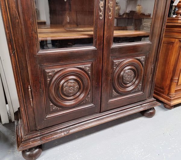 Substantial French Henry 2nd Walnut two door bookcase. It has five fully adjustable shelves and has been sourced from France. It is in good original detailed condition.