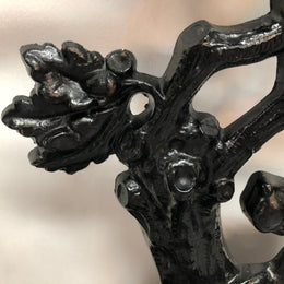 Black Cast Iron Umbrella Stand Displaying A Dog Under A Tree