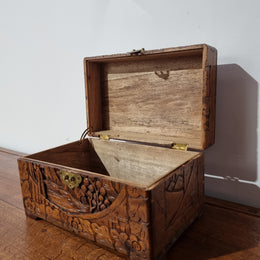 Small Chinese carved camphor wood jewellery box. It is in original condition.