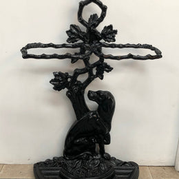 Black Cast Iron Umbrella Stand Displaying A Dog Under A Tree