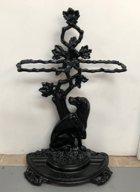 Black Cast Iron Umbrella Stand Displaying A Dog Under A Tree