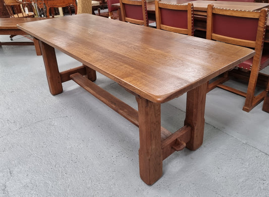 French Oak Farmhouse table with a beautiful pedestal base and can easily be extended by adding extension leaves at both ends. In good original restored condition.