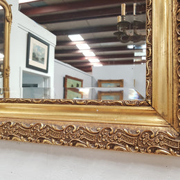 A stunning French 19th century gilded wall mirror in good original condition.