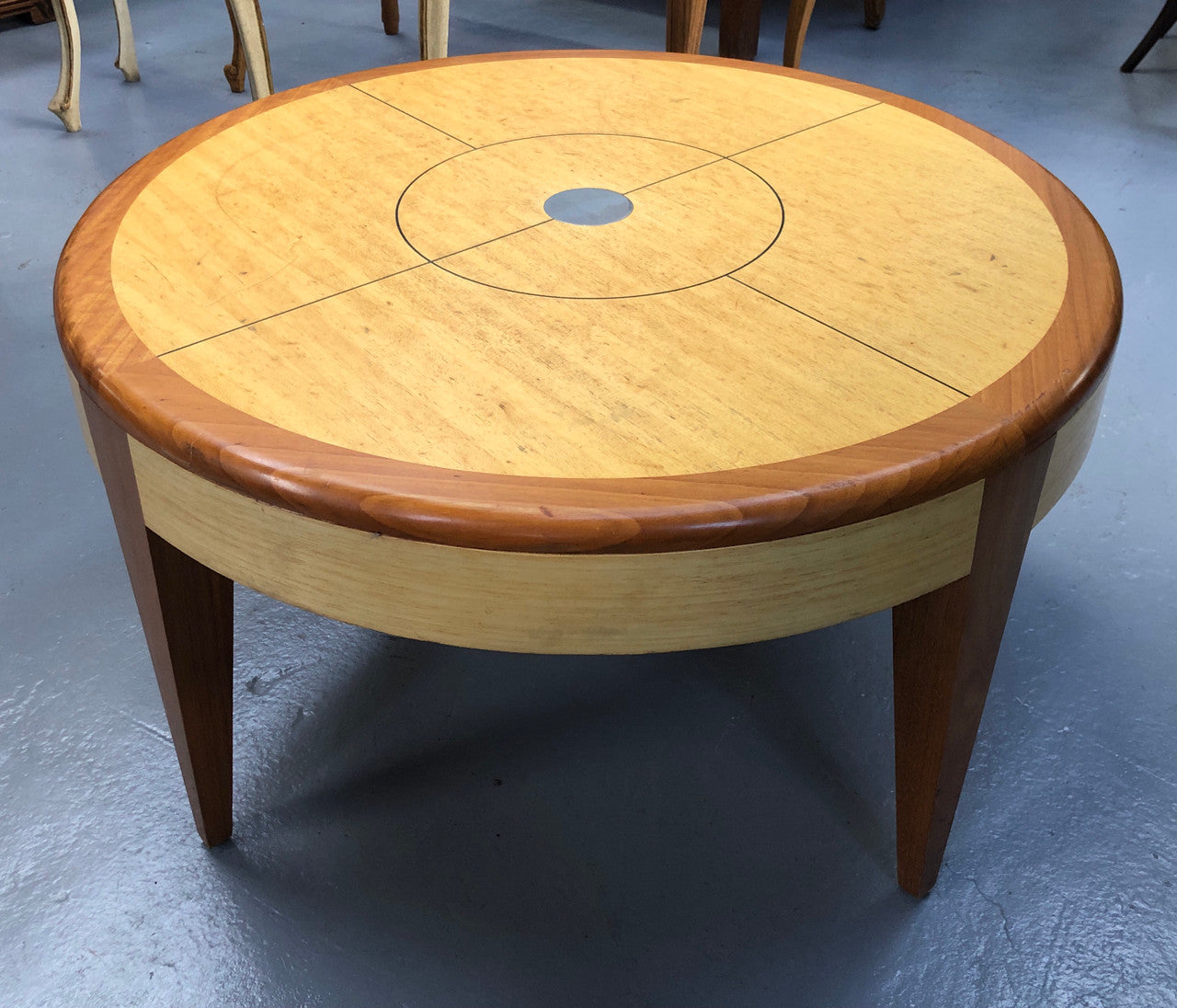 Lovely Vintage round Mahogany and blonde wood coffee table by (Alexander J Cook). It is in good original condition.