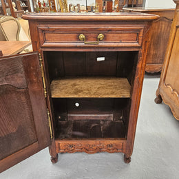 Louis 15th style oak 19th century cabinet with lovely brass hinges, handles & charming carving.  Circ: 1860's. In good original condition.