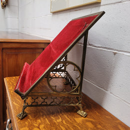 Antique French brass Gothic Revival book stand with red velvet. It has sourced from France and is in good original condition.