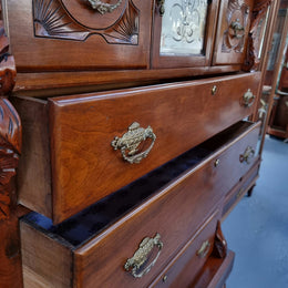 A 19th Century Scottish Mahogany tall boy/ chest of six drawers with small cabinet section at the top. Beautiful carvings and easily comes apart into three sections making transport for moving into place easy. In good original detailed condition.