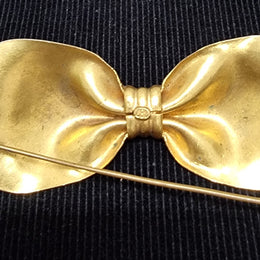 Vintage gilt brass neck tie brooch in great original condition. Stamped 187. Please view photos as they help form part of the description.