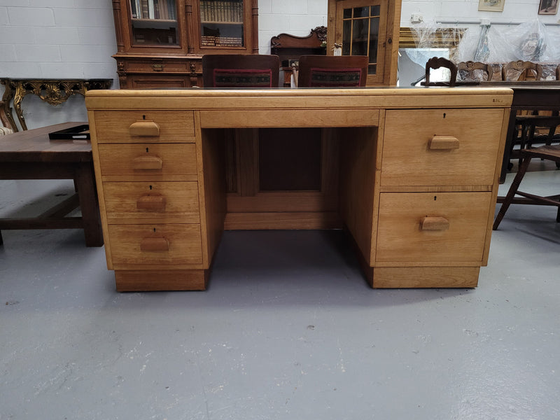 Parliament house desk made from Queensland maple. Desk has room numbers stamped to front. It's in good original condition. Purchased from a sale in old Parliament House in the late 1980's.