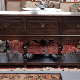 A very hard to find Vintage English kitchen dresser base of narrow proportions, sourced from France. In good original detailed condition.