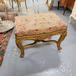 Charming 19th Century gilt wood tapestry covered Louis XV style stool. It has a beautifully carved base and undercarriage and it has been sourced from France. It is in good original detailed condition, please view photos of tapestry has they help form part of the description.