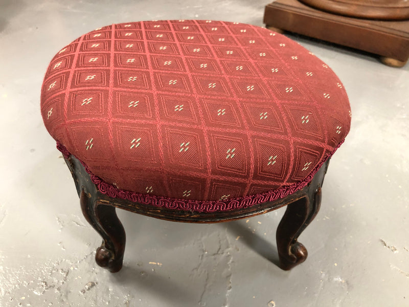 Upholstered Antique Mahogany round foot stool with beautiful carved feet. In very good original condition.