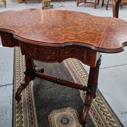 Fabulous marquetry inlaid side table with marquetry extensions and one drawer. Stunning side table or small ladies desk.