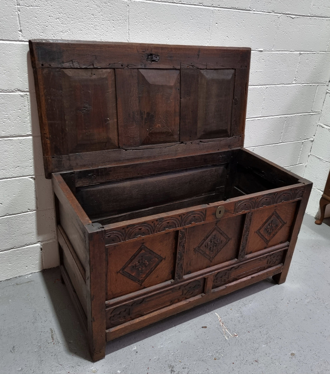 Early 19th Century French Oak carved coffer with a lift up lid for storage. A beautiful piece and in good original condition.