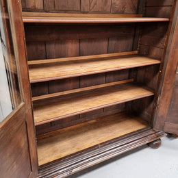 Substantial French Henry 2nd Walnut two door bookcase. It has five fully adjustable shelves and has been sourced from France. It is in good original detailed condition.