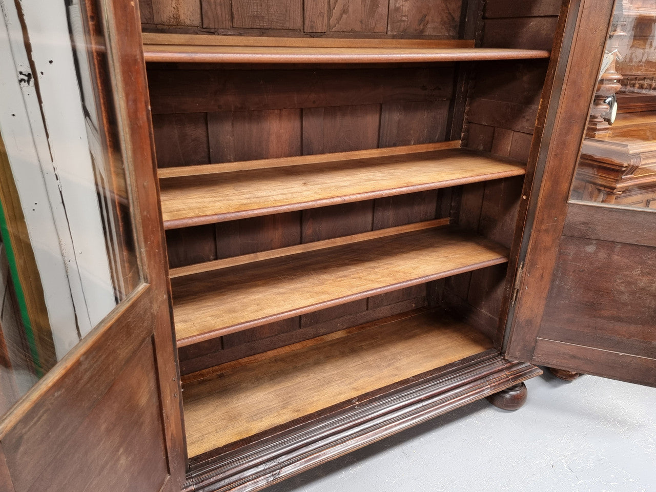 Substantial French Henry 2nd Walnut two door bookcase. It has five fully adjustable shelves and has been sourced from France. It is in good original detailed condition.