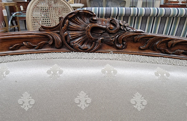Pretty French Louis XV style small Walnut settee with very good upholstery. Sourced from France and in good original condition, please view photos of the upholstery as it helps form part of the description.