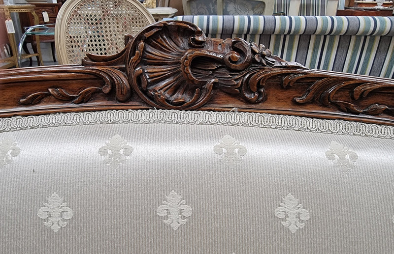 Pretty French Louis XV style small Walnut settee with very good upholstery. Sourced from France and in good original condition, please view photos of the upholstery as it helps form part of the description.