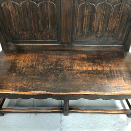 French 19th Century Oak hallway bench seat. Very comfortable to sit on and is in good original detailed condition.
