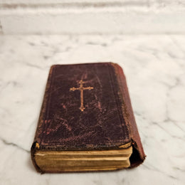 Very small antique leather bound Key of Heaven Manual of Prayer Book printed by M H Gill & Son Dublin. Condition commensurate with age.