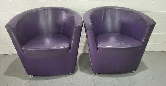 Pair of vintage Parentesi armchairs designed by Pietro Arosio for Tacchini with original leather upholstery and in good original detailed condition.