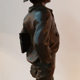 Fabulous French bronze statue of a school boy from the early 20th century. Signed by Marcel Debut ( 1865-1933) and its titled School Boy.