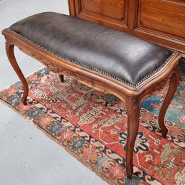 Impressive French Louis 15th style walnut upholstered duet leather stool. Very Good Condition.  Circa: 1930’s, sourced in France.