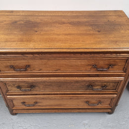 French solid Oak Louis 14th style chest of three drawers. It has three large spacious drawers and it has been sourced from France. It is in good original detailed condition.